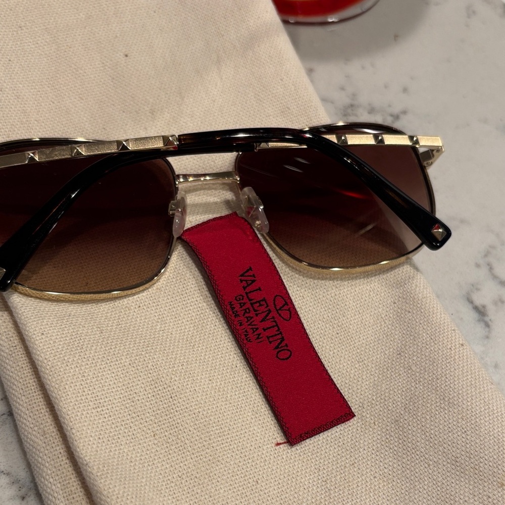 Valentino Black Frame Sunglasses with Gold Detailing